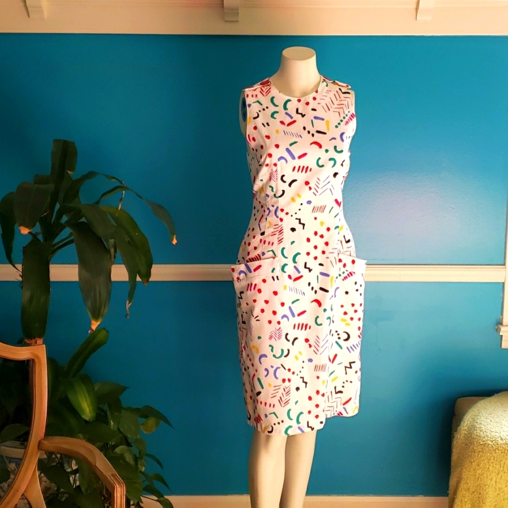 VINTAGE SUNDRESS Geary Roark Kamisoto. Size 10. White with multicolored pattern.